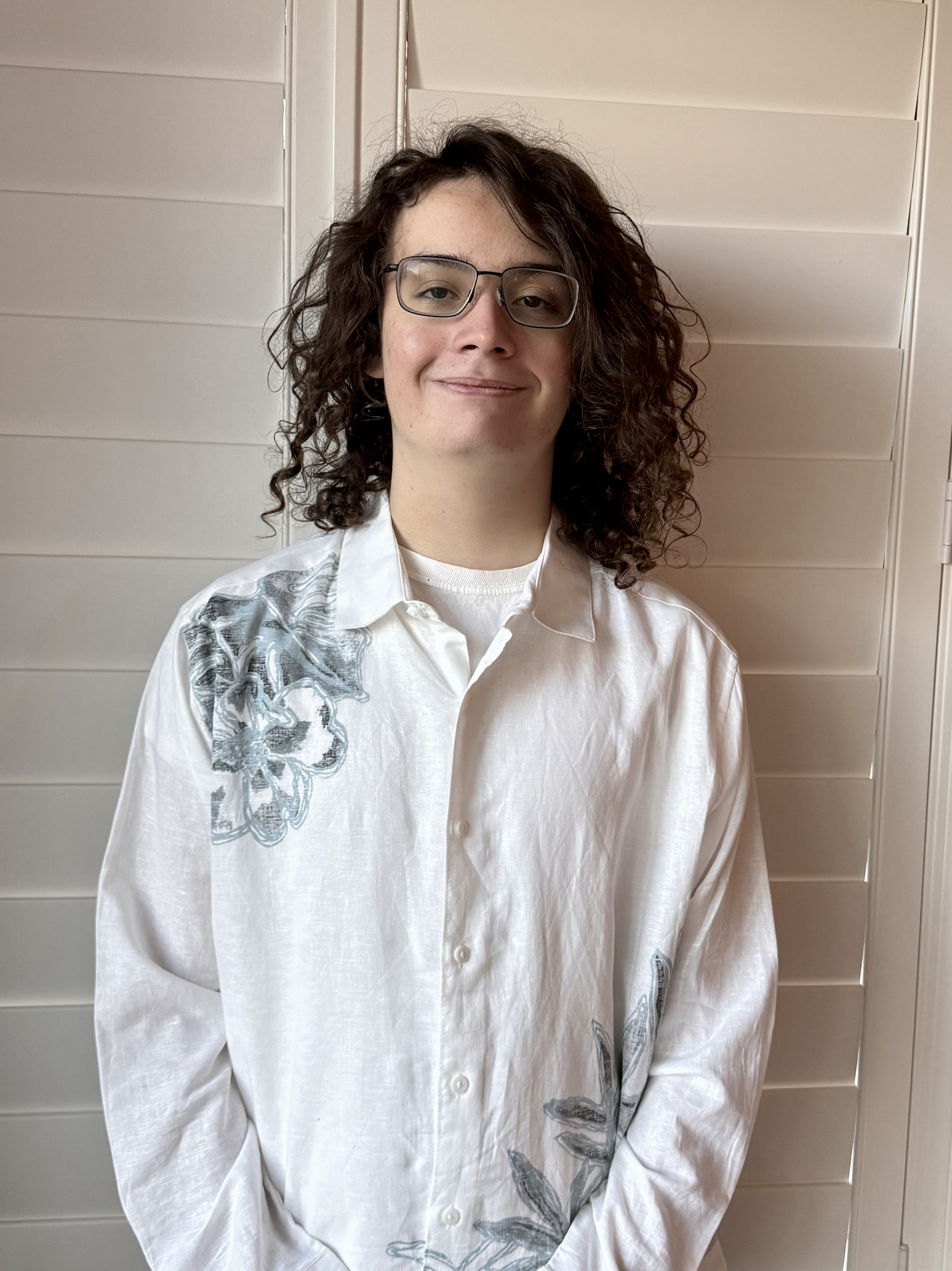 An image of SillySelene, wearing a white dress shirt.
